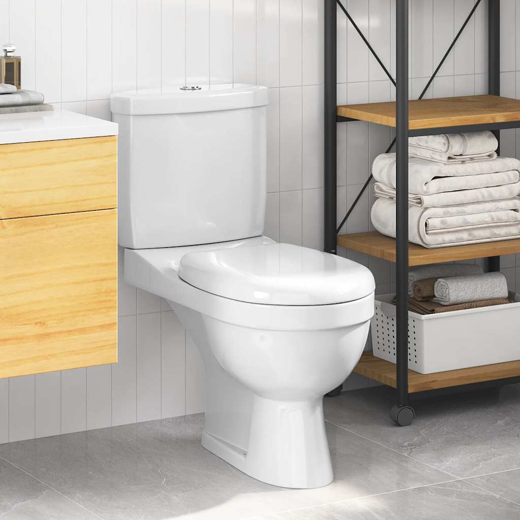 Toilette mit Spülkasten Weiß
