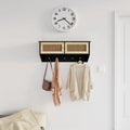 Wandgarderobe Schwarz Holzwerkstoff und Rattan Natur