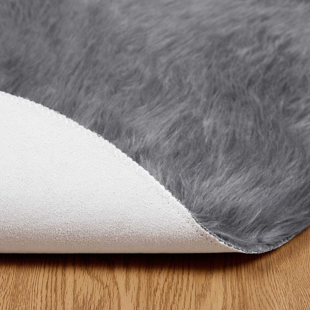 Teppich aus Kunstschaffell TAFALLA Anthrazit Ø 120 cm Polyester