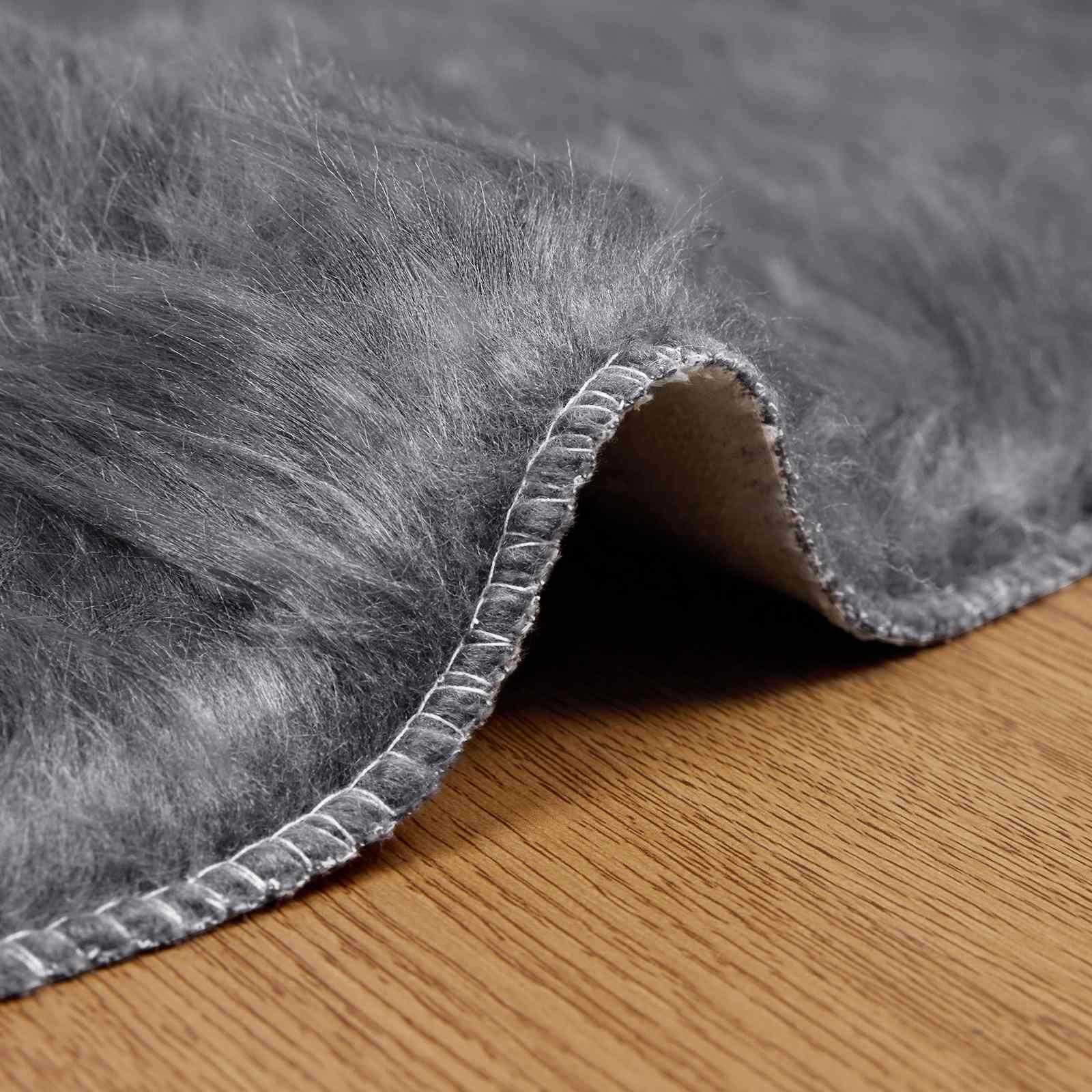 Teppich aus Kunstschaffell TAFALLA Anthrazit Ø 120 cm Polyester
