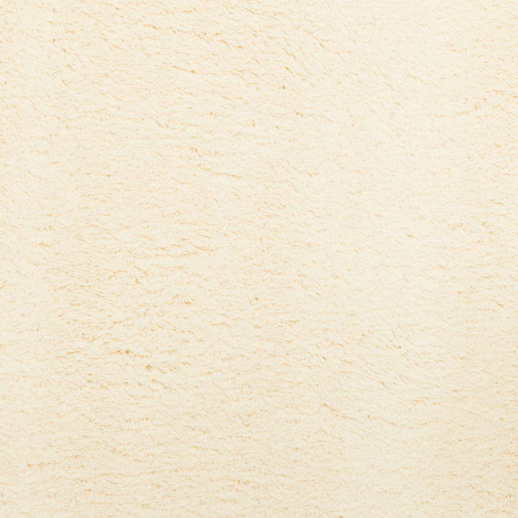 Mittlerer Flor weicher und waschbarer Teppich HUARTE Creme